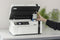 Impresora multifunción Epson EcoTank M2120 con wifi blanca